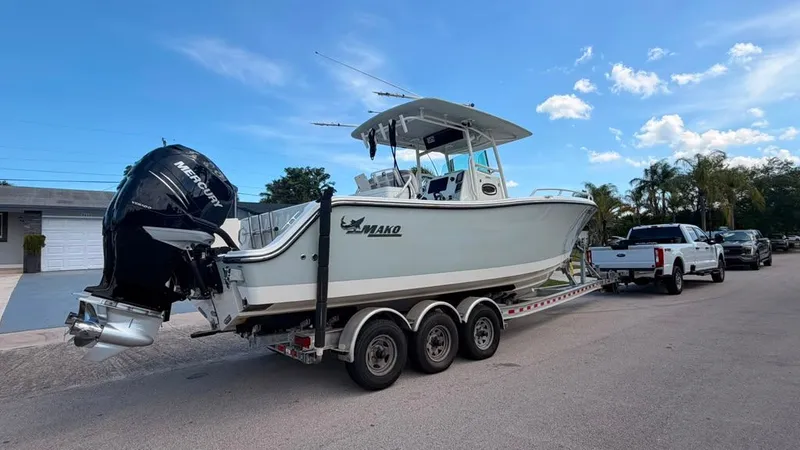 Slide: The Image of 2015 Mako 284 Center Console on a trailer, ready for transport. - 34