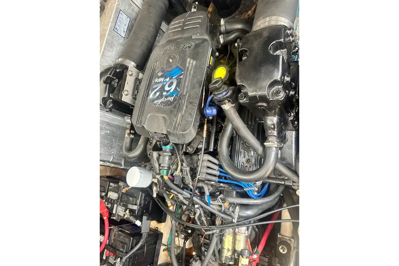 Slide: The Image of Engine of a 2007 Sea Ray Sundancer 310 boat, showcasing detailed components. - 51