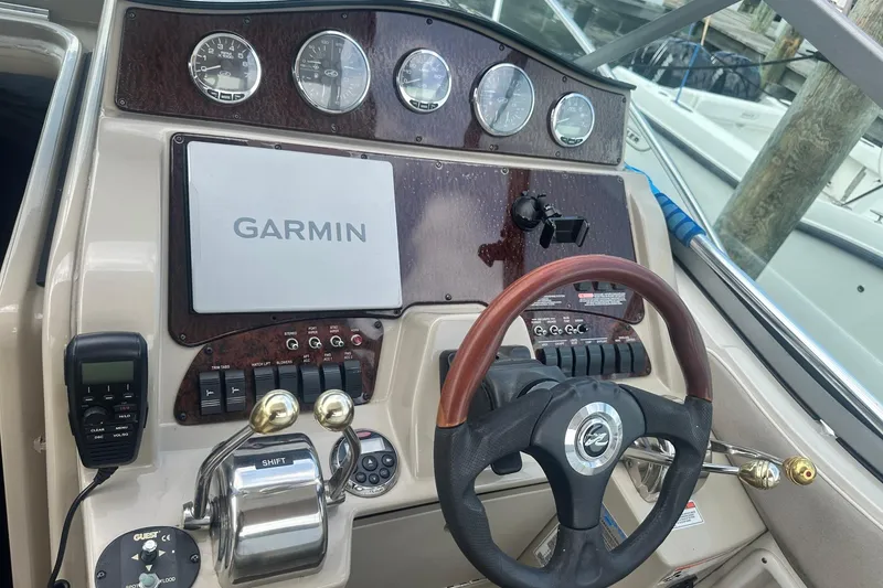 Slide: The Image of Dashboard of a 2007 Sea Ray Sundancer 310 with Garmin navigation system. - 19