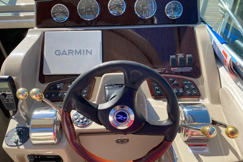 Slide: The Image of Dashboard of a 2007 Sea Ray Sundancer 310 with Garmin navigation system. - 18