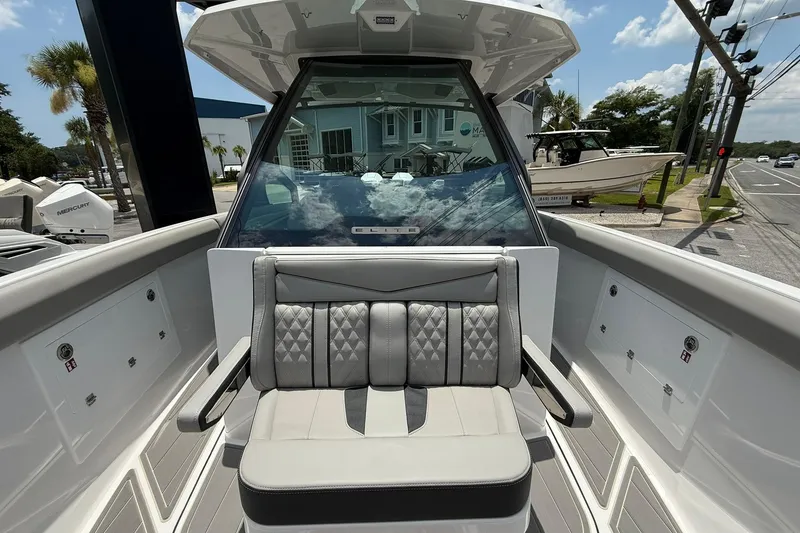Slide: The Image of 2027 Monterey Elite 30 OB boat interior with luxurious seating and modern design. - 6