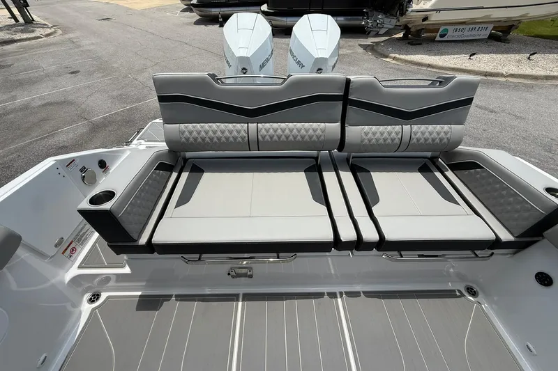 Slide: The Image of 2027 Monterey Elite 30 OB boat interior with luxurious seating and modern design. - 18