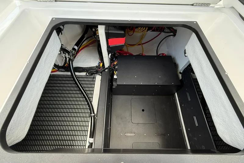 Slide: The Image of Engine compartment of 2027 Monterey Elite 30 OB boat, showcasing wiring and components. - 19