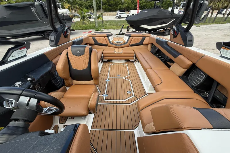 Slide: The Image of Luxurious interior of 2021 Nautique Super Air Nautique G25 Coastal Edition boat. - 3