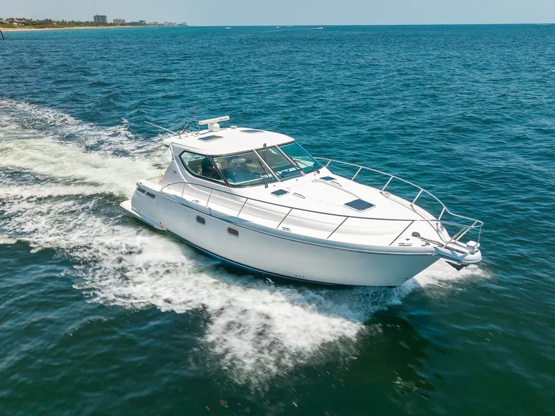 Slide: The Image of A 2008 Tiara Yachts 4300 Sovran cruising swiftly on the open sea. - 2