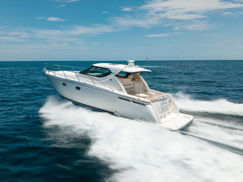 Slide: The Image of A 2008 Tiara Yachts 4300 Sovran speeding across the ocean. - 10