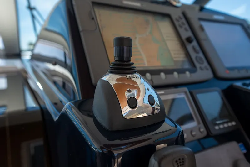 Slide: The Image of Close-up of the helm of a 2008 Tiara Yachts 4300 Sovran with navigation system. - 15