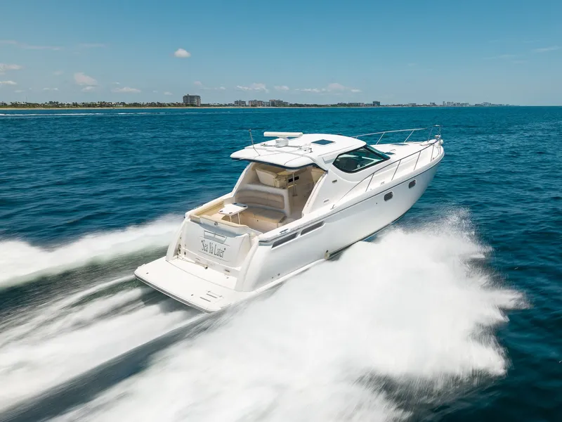 Slide: The Image of A 2008 Tiara Yachts 4300 Sovran speeding across the ocean. - 8