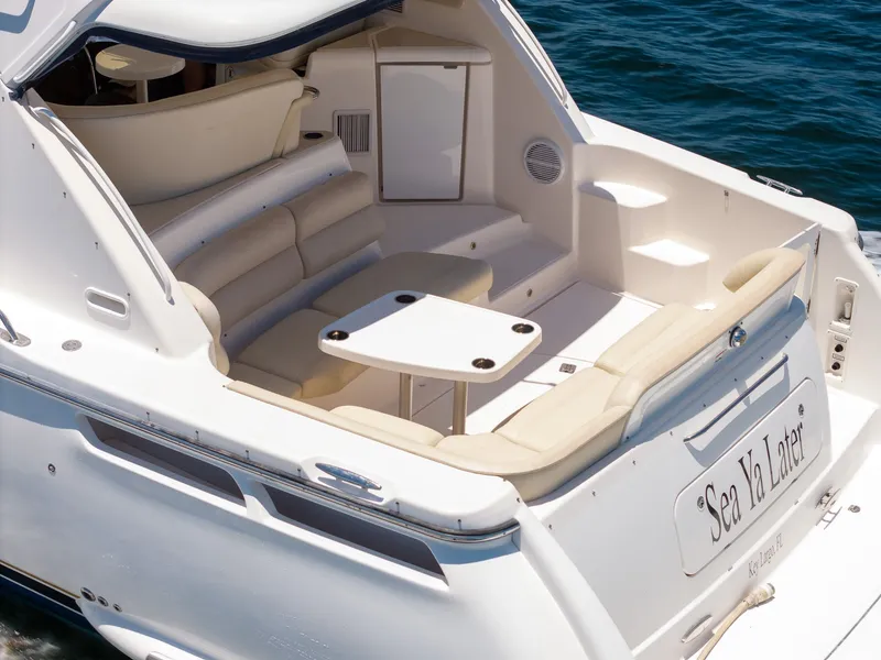 Slide: The Image of The image shows the stern of a 2008 Tiara Yachts 4300 Sovran with a seating area. - 5