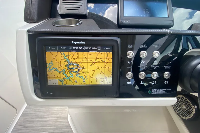 Slide: The Image of Control panel of a 2018 Sea Ray SLX 350 with Raymarine navigation display. - 26