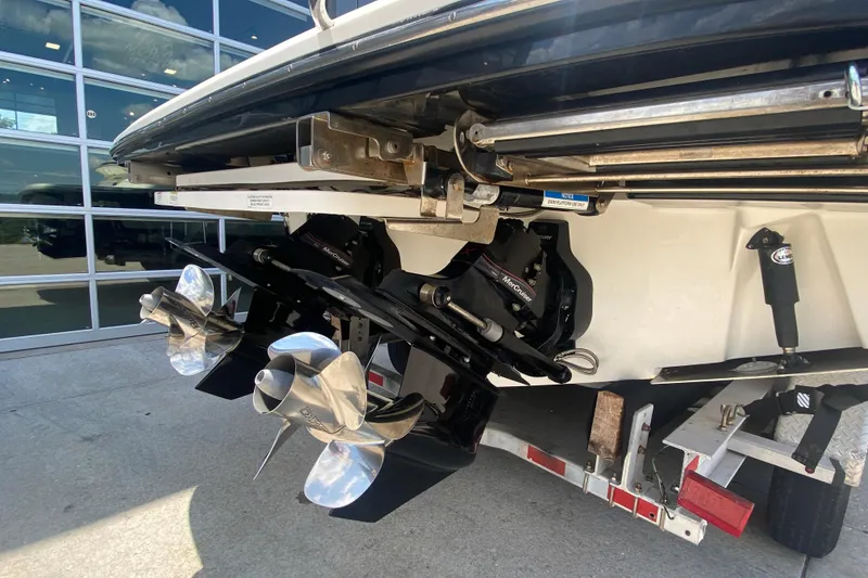 Slide: The Image of 2018 Sea Ray SLX 350 boat stern with dual propellers and MerCruiser engines. - 8