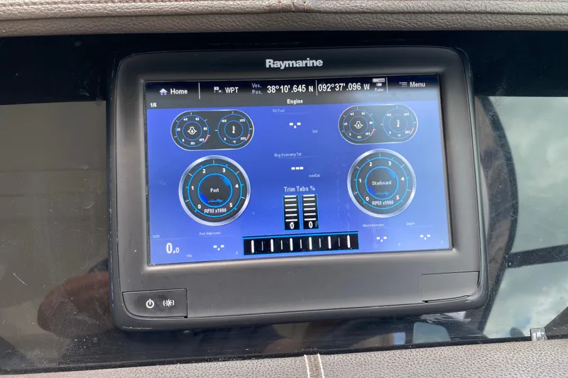 Slide: The Image of Raymarine display on 2018 Sea Ray SLX 350 showing engine and navigation data. - 27