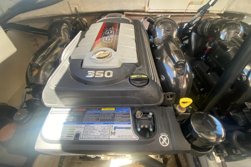 Slide: The Image of Engine compartment of a 2018 Sea Ray SLX 350 boat, featuring a 6.2L engine. - 49