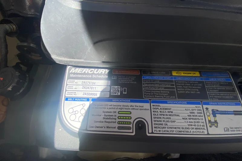 Slide: The Image of Mercury maintenance schedule label on a 2018 Sea Ray SLX 350 engine. - 44
