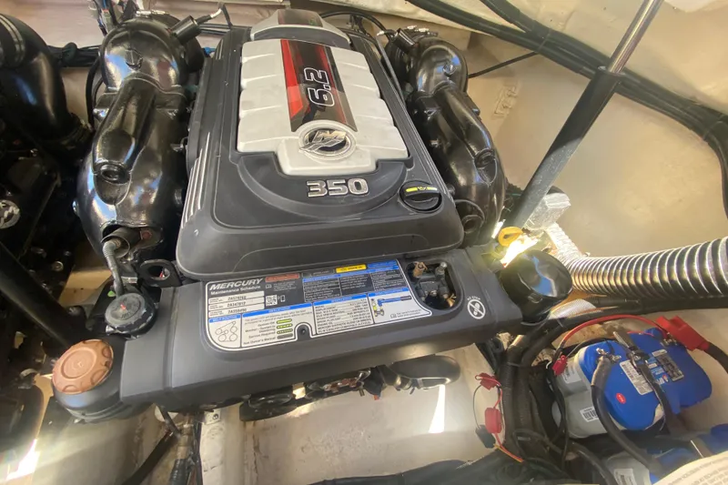 Slide: The Image of Engine compartment of a 2018 Sea Ray SLX 350 boat, featuring a Mercury 6.2L engine. - 45