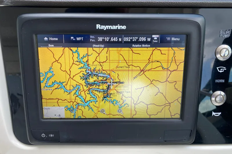Slide: The Image of Raymarine GPS display on 2018 Sea Ray SLX 350, showing navigation map and coordinates. - 47