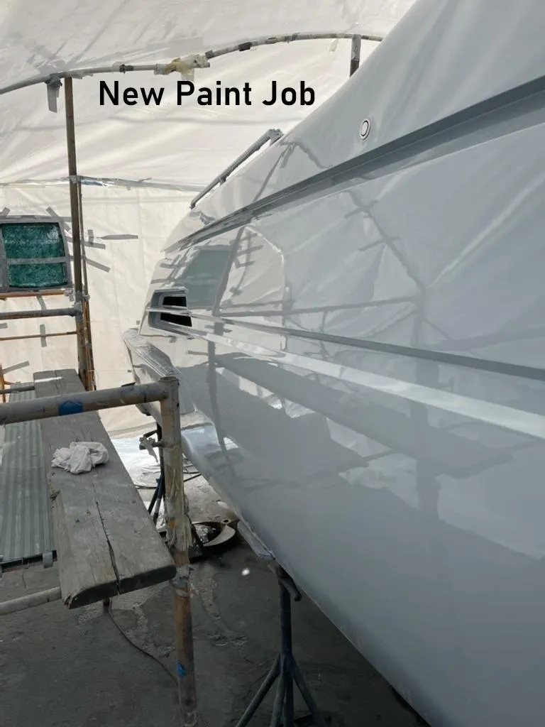 Slide: The Image of 2018 Canard Yachts eMotion HYBRID with fresh paint job in a workshop setting. - 25