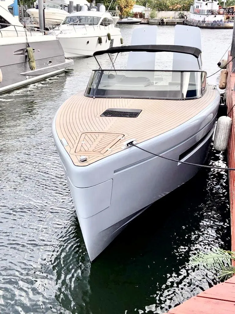 Slide: The Image of Luxury Canard Yachts eMotion HYBRID 2018 docked, showcasing sleek design and modern features. - 33