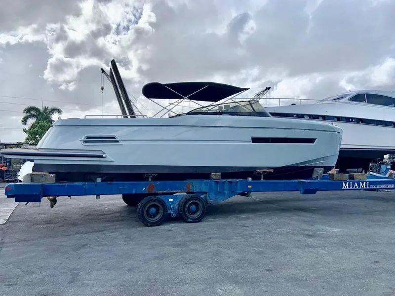 Slide: The Image of 2018 Canard Yachts eMotion HYBRID on trailer, overcast sky background. - 29