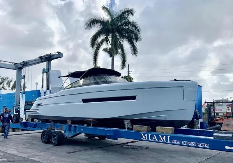 Slide: The Image of 2018 Canard Yachts eMotion HYBRID on trailer at Miami Yacht & Engine Works. - 27