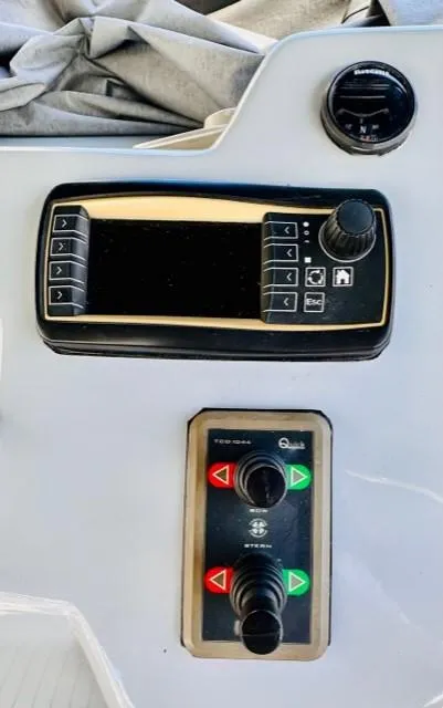 Slide: The Image of Control panel of 2018 Canard Yachts eMotion HYBRID with navigation and joystick controls. - 16