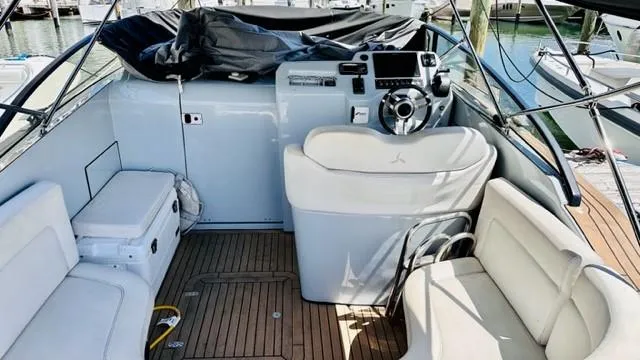 Slide: The Image of 2018 Canard Yachts eMotion HYBRID interior with modern helm and seating. - 13