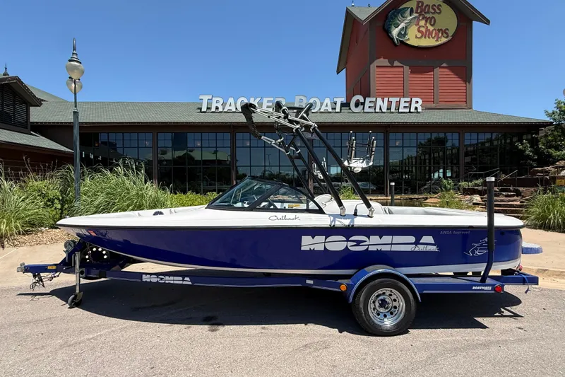 The Image of 2001 Moomba Outback boat on trailer at Tracker Boat Center, Bass Pro Shops. - 0