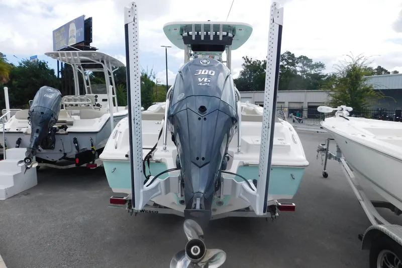 Slide: The Image of 2024 Key West 239 FS boat with Yamaha 300 V6 engine, displayed outdoors. - 3