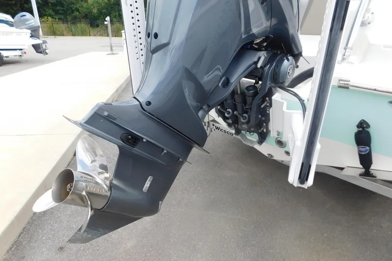Slide: The Image of 2024 Key West 239 FS boat with Yamaha outboard motor, showcasing propeller and engine details. - 4