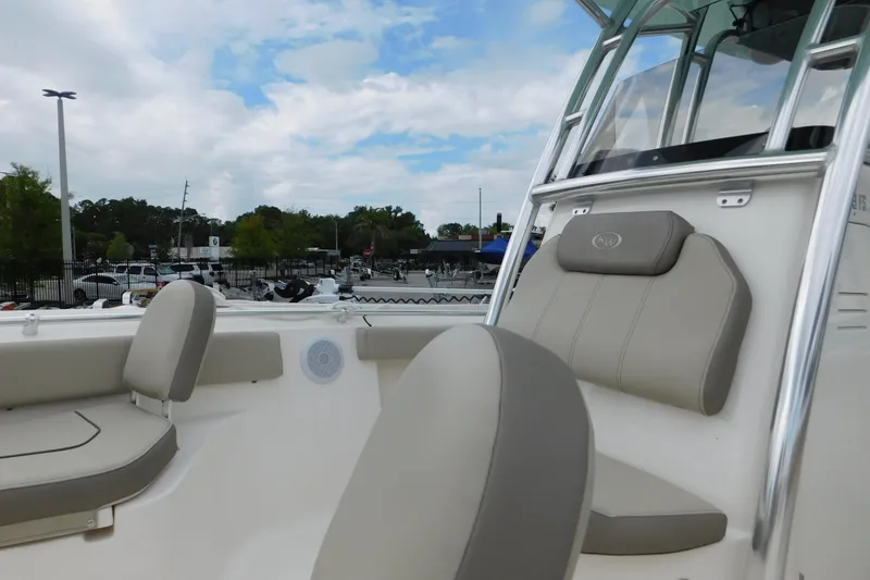Slide: The Image of 2024 Key West 239 FS boat interior with comfortable seating and sleek design. - 12