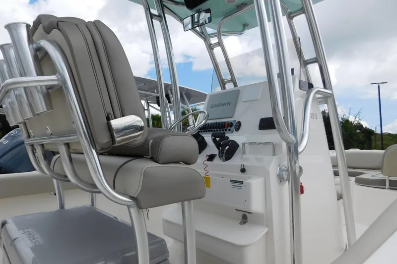 Slide: The Image of 2024 Key West 239 FS boat console with Garmin electronics and seating. - 7