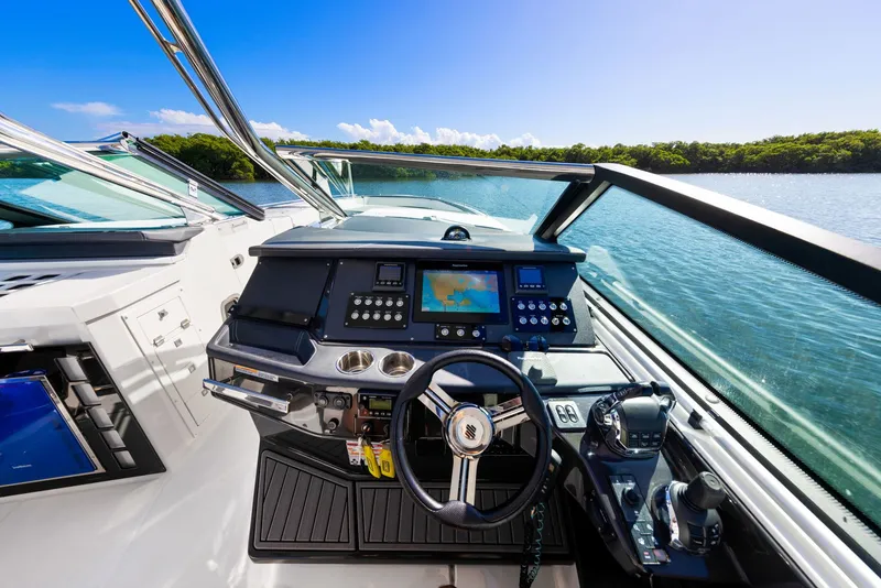 Slide: The Image of The cockpit of a 2017 Monterey 378SE Super Express with modern steering and electronics. - 14