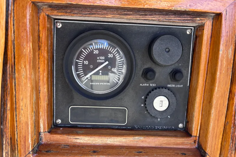 Slide: The Image of Vintage Volvo Penta tachometer on 1978 Swift 33 boat dashboard. - 26