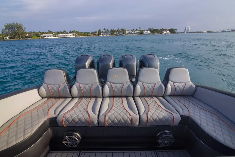 Slide: The Image of Luxury seating on a 2019 Midnight Express 43 Open boat, with scenic ocean view. - 19