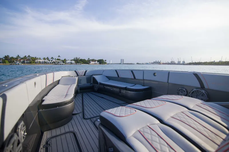 Slide: The Image of Luxurious 2019 Midnight Express 43 Open boat interior with waterfront view. - 20