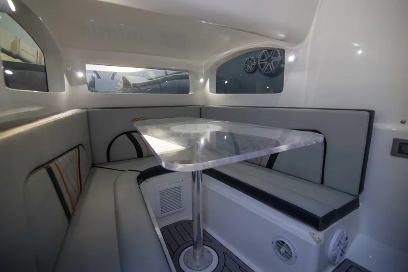 Slide: The Image of Interior of 2019 Midnight Express 43 Open boat with seating and table. - 14