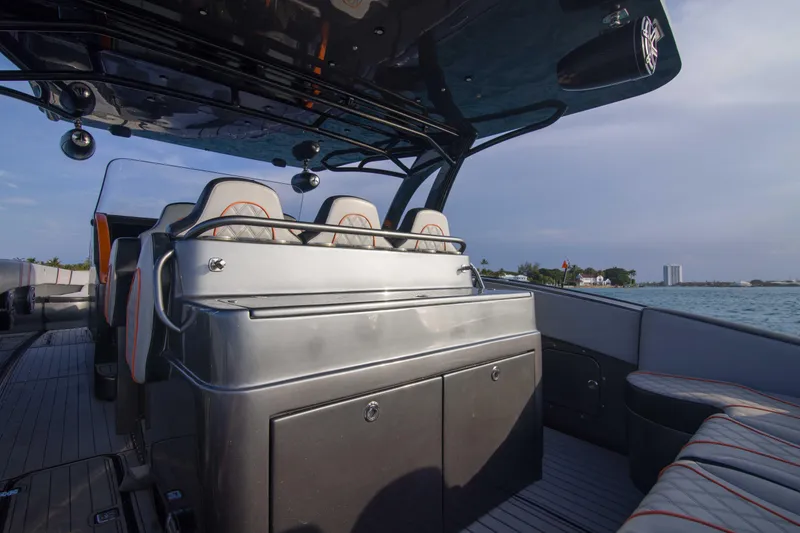 Slide: The Image of 2019 Midnight Express 43 Open boat interior with sleek seating and modern design. - 9