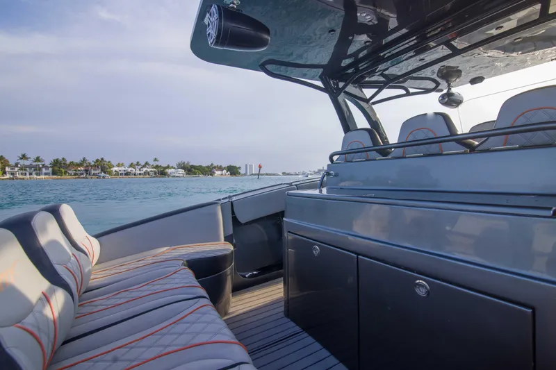 Slide: The Image of 2019 Midnight Express 43 Open boat interior with luxurious seating and ocean view. - 8