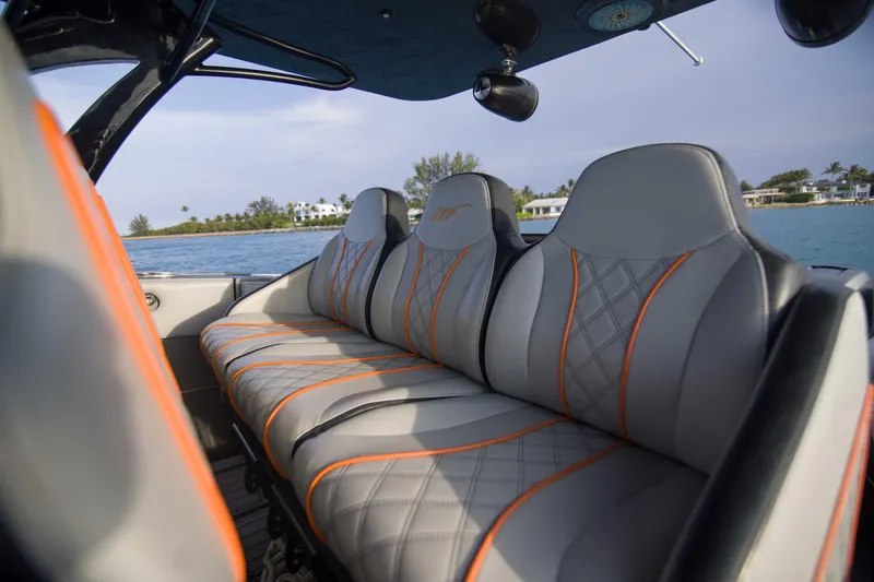 Slide: The Image of Luxurious seating on 2019 Midnight Express 43 Open boat with scenic water view. - 7