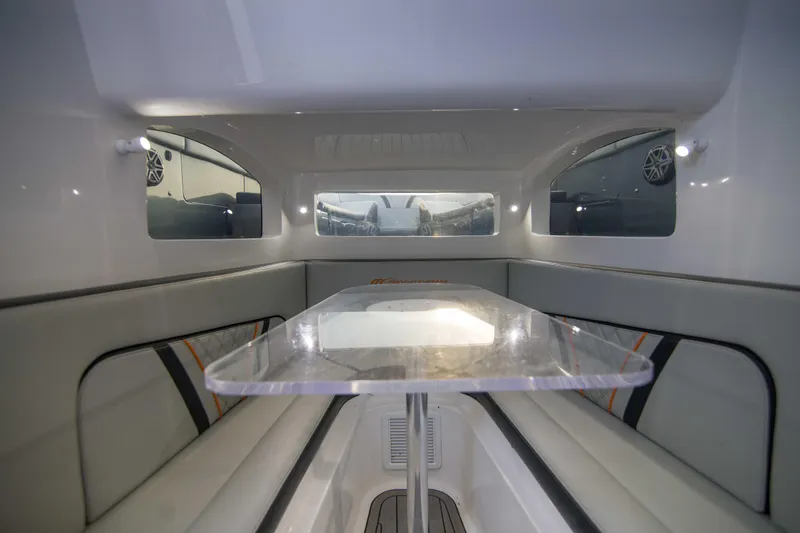 Slide: The Image of Interior of 2019 Midnight Express 43 Open boat with sleek seating and table. - 13