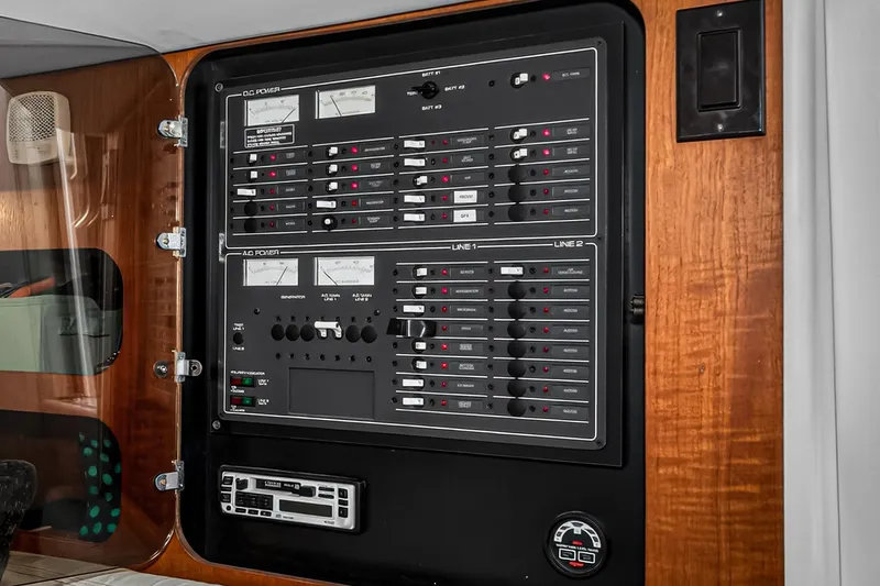 Slide: The Image of Electrical control panel on a 1995 Tiara Yachts 3100 Open boat. - 12