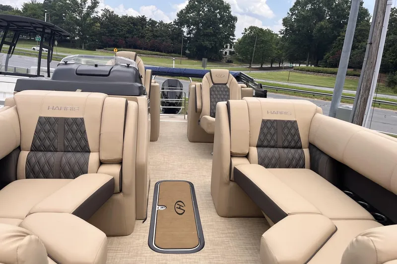 Slide: The Image of Luxurious interior of 2022 Harris Solstice 230 CWDH pontoon boat with plush seating. - 6
