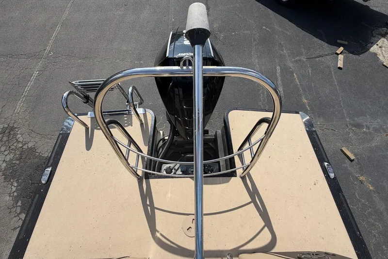 Slide: The Image of Rear view of 2022 Harris Solstice 230 CWDH boat with motor and railing. - 7