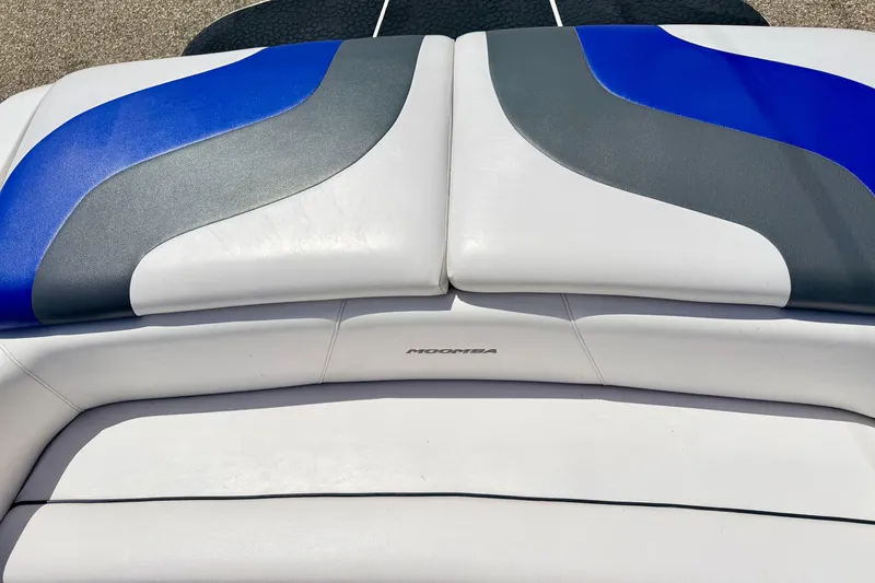 Slide: The Image of 2008 Moomba Outback V boat seat with blue and gray accents. - 18