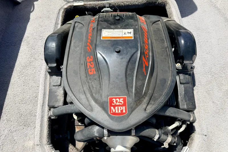 Slide: The Image of 2008 Moomba Outback V engine, 325 MPI, black cover with red lettering. - 30