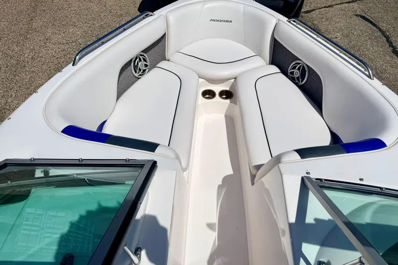 Slide: The Image of 2008 Moomba Outback V boat interior with white seating and cup holders. - 49