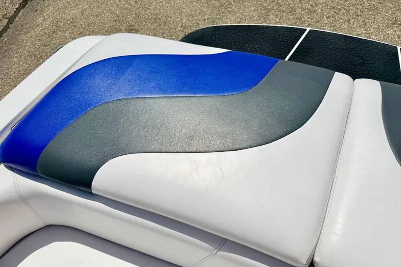 Slide: The Image of 2008 Moomba Outback V boat seat with blue, gray, and white upholstery design. - 19