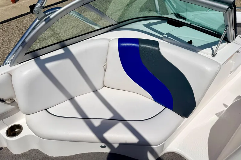 Slide: The Image of 2008 Moomba Outback V boat interior with white and blue seating. - 32