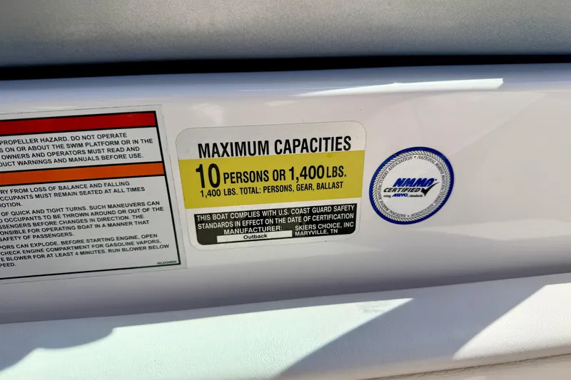 Slide: The Image of 2008 Moomba Outback V capacity label, maximum 10 persons or 1,400 lbs, NMMA certified. - 44