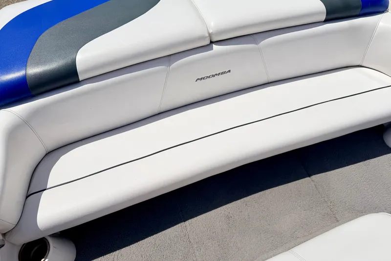 Slide: The Image of 2008 Moomba Outback V boat interior with white and blue seating. - 24